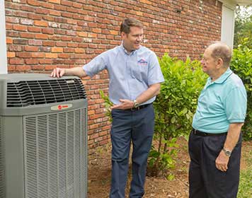 hvac-technician-talking-with-homeowner