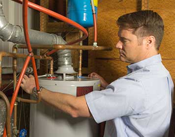 When Should I Call Someone to Flush Our Water Heater?
