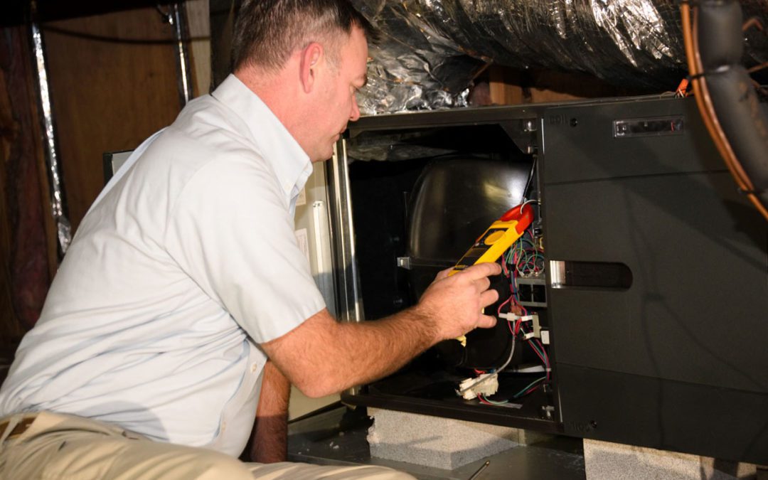 hvac-technician-repairing-heater