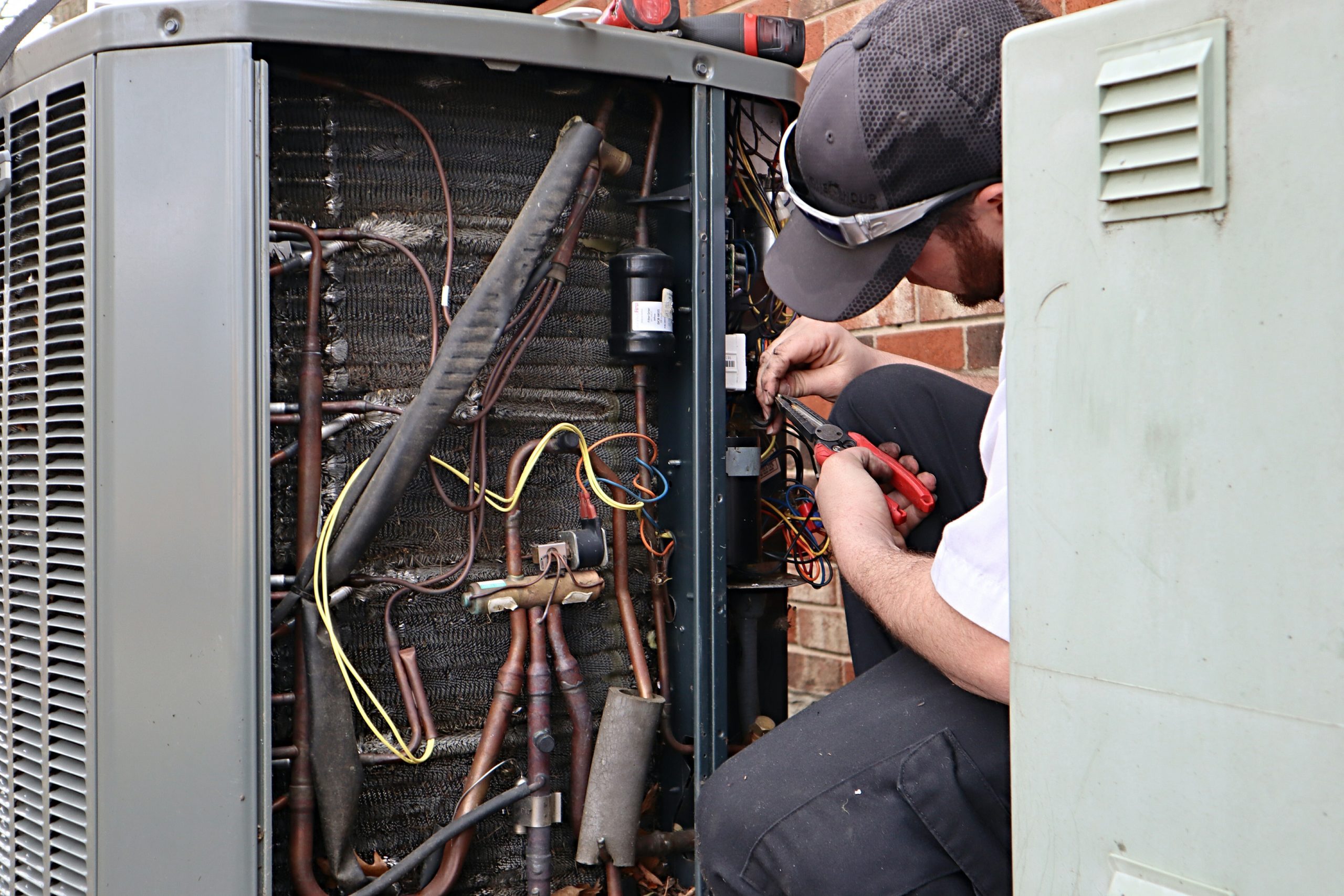 service-repair-being-done-on-a-heat-pump-hvac-syst-2021-08-29-01-18-52-utc