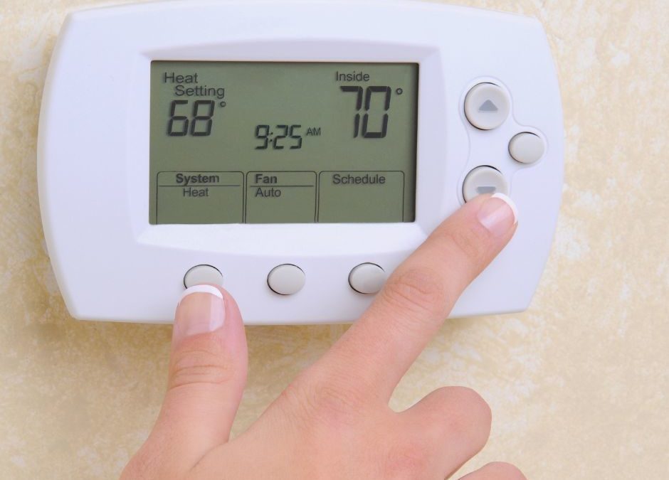 Person-Adjusting-Thermostat