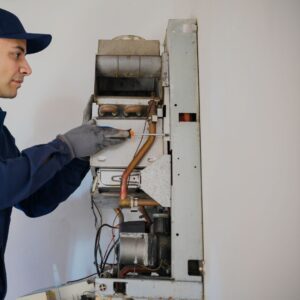 plumber-working-on-tankless-water-heater