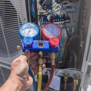 checking-gauges-on-hvac-system