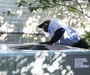 HVAC-Technician-Working-on-Heating-and-Air-Conditioning-System