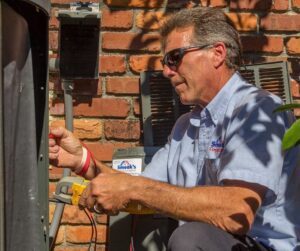 Older-Male-Working-on-HVAC-System