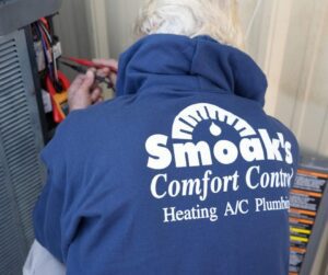 Older-Male-HVAC-Technician-Working-on-HVAC-System