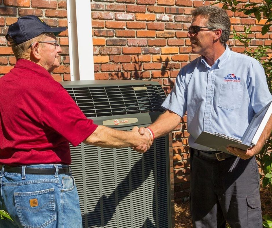 Happy-Smoaks-Customer-Shaking-Hands-with-HVAC-Technician