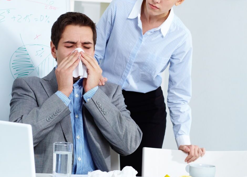 business-man-blowing-nose-with-woman-watching