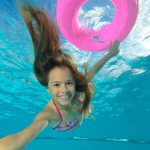 Young-Girl-Underwater-in-Pool